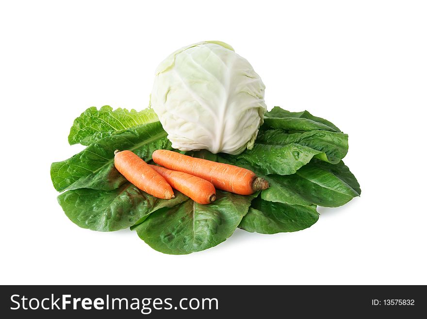 Cabbage, carrot, lettuce isolated on a white background with paths. Cabbage, carrot, lettuce isolated on a white background with paths