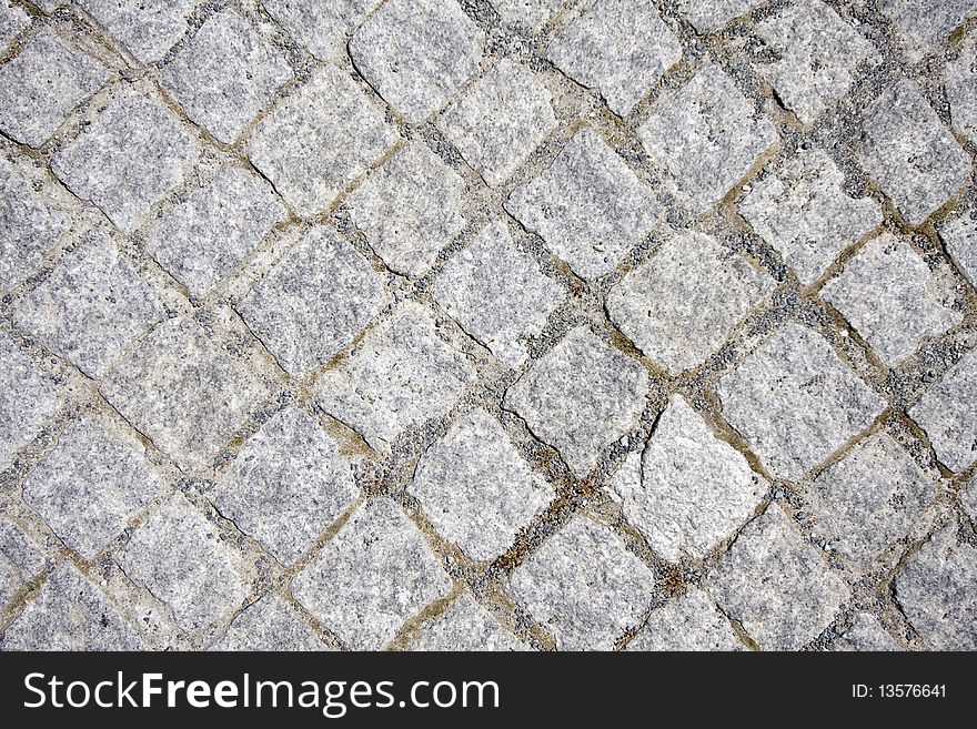 Stone street road pavement texture (gray granite blocks). Stone street road pavement texture (gray granite blocks)