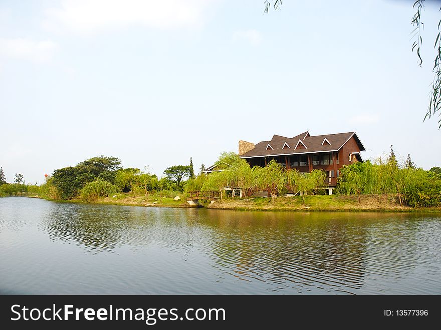 The lake, the villa and the inverted image, it’s a beautiful view in spring. The lake, the villa and the inverted image, it’s a beautiful view in spring