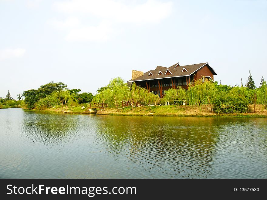 The lake, the villa and the inverted image, it’s a beautiful view in spring. The lake, the villa and the inverted image, it’s a beautiful view in spring.