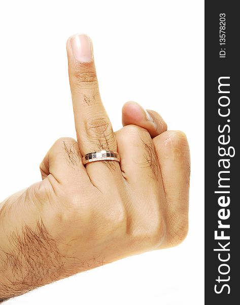 This is a beautiful silver ring wearing in a men finger isolated on a white background. This is a beautiful silver ring wearing in a men finger isolated on a white background.