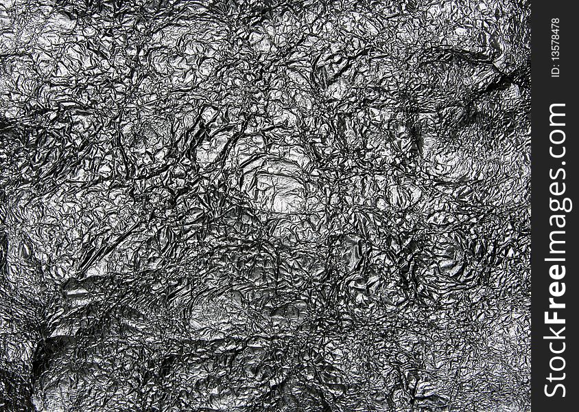 Background of crumpled metal foil