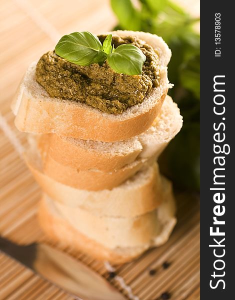 Baguette with green fresh pesto