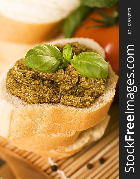 Baguette with green fresh pesto