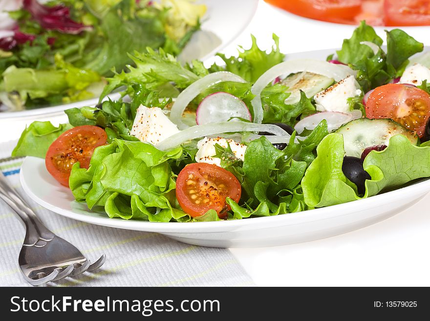 Fresh salad with vegetables and feta cheese. Fresh salad with vegetables and feta cheese