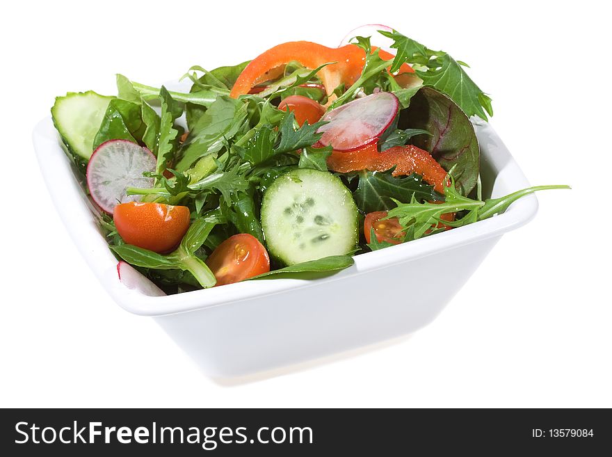 Healthy vegetable salad on white background