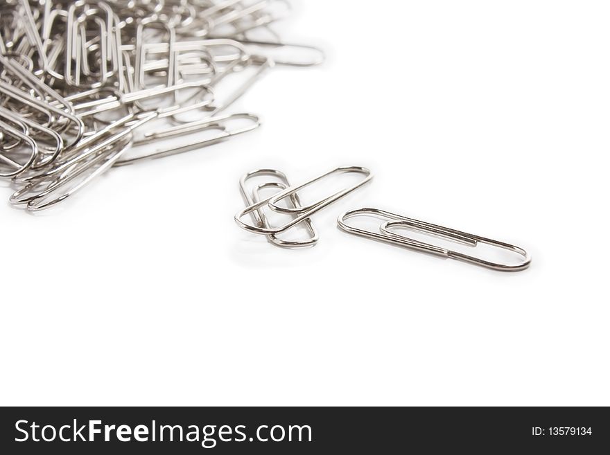 Paper clips. Isolated on white. Paper clips. Isolated on white