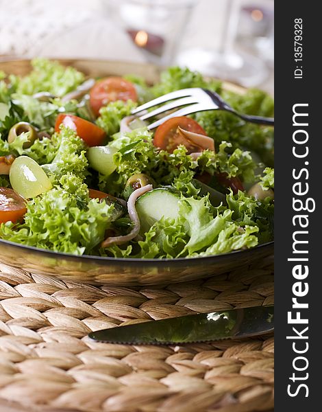 Healthy green salad Isolated on white.