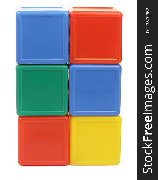 Colored childrens cubes on a white background. Colored childrens cubes on a white background