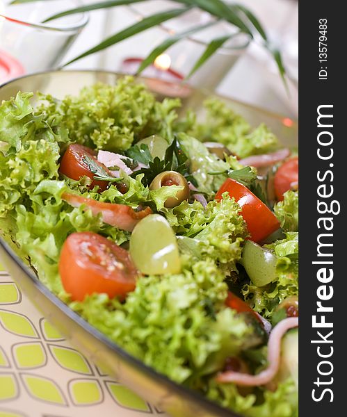 Healthy green salad Isolated on white.