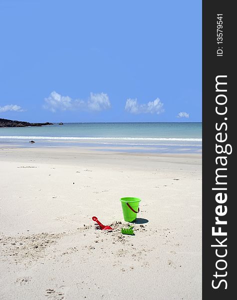 Colourful Beach Toys On A Secluded Beach