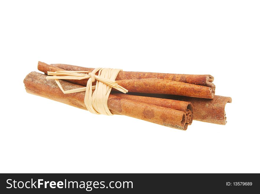 Bundle of cinnamon sticks isolated on white