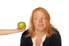 Woman Looking At An Apple Stock Image