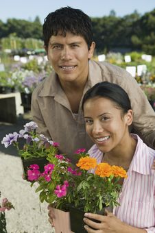 Couple Shopping At Plant Nursery Royalty Free Stock Images Couple Shopping At Plant Nursery Royalty Free Stock Images