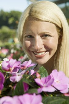 Woman Holding Flowers Stock Photos