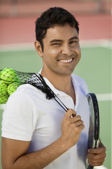 Man On Tennis Court With Tennis Balls And Racket Royalty Free Stock Photos Man On Tennis Court With Tennis Balls And Racket Royalty Free Stock Photos