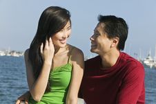 Free Couple Relaxing On Boat Royalty Free Stock Images - 13584839