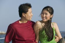 Free Couple Relaxing On Boat Royalty Free Stock Photography - 13584847