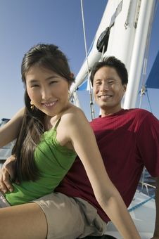 Free Couple Relaxing On Boat Stock Image - 13584851