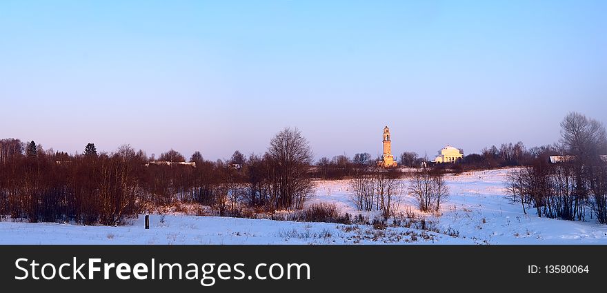 Rural church in the snow forest in the evening. Rural church in the snow forest in the evening