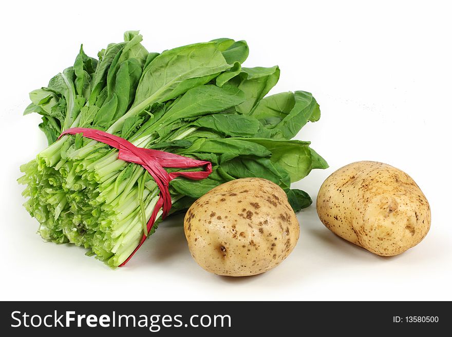 Chinese cabbage and potato on white background. Chinese cabbage and potato on white background