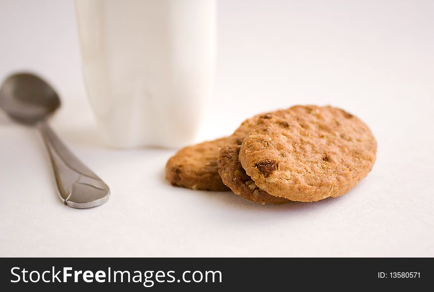 Cookies and yogurt on a white background