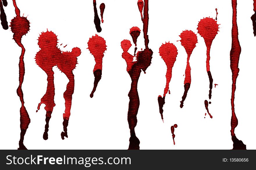 Spots of red watercolor on an isolated white background