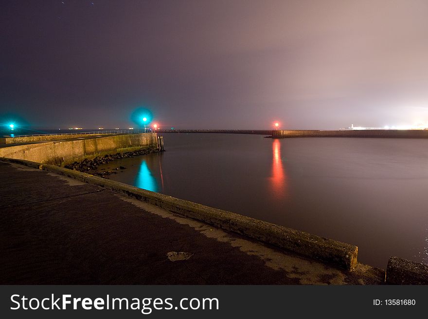 The harbour of Scheveningen at night. The harbour of Scheveningen at night.