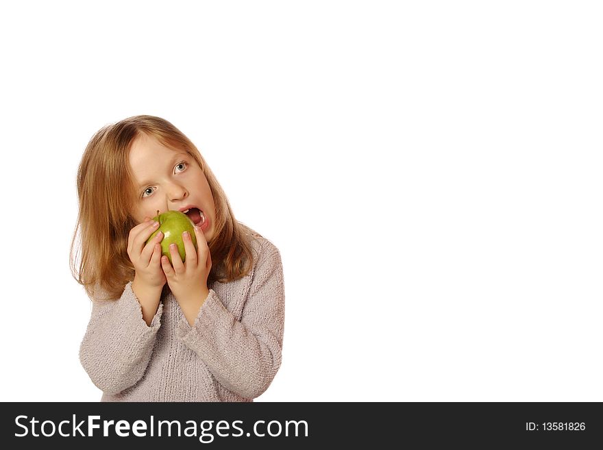 Young girl eating an apple on an isolated background. Young girl eating an apple on an isolated background
