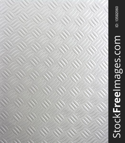 A silver metallic steel background