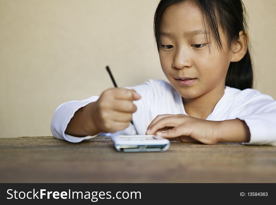 Asian ethnic Girl using PDA