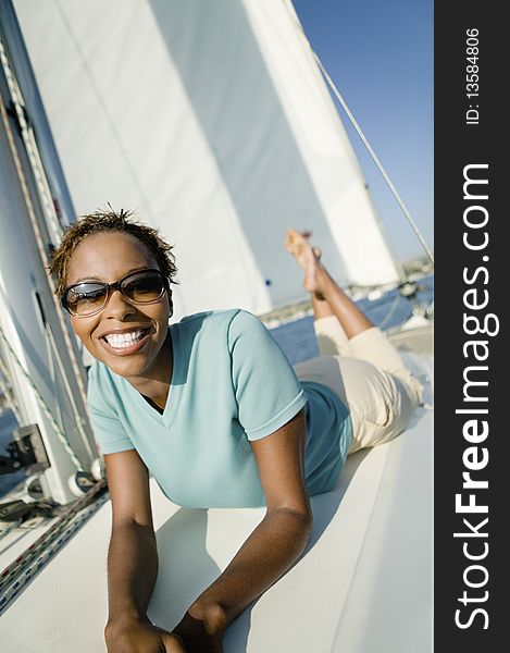 Woman Relaxing On Yacht
