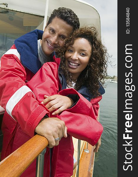 Middle aged Couple on yacht, (portrait)