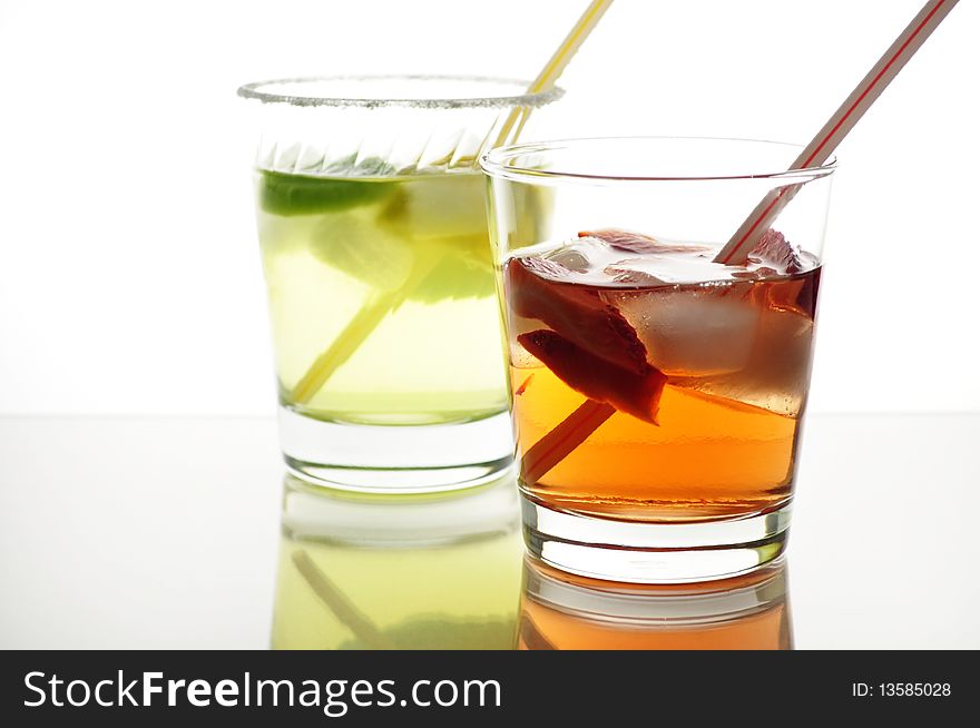 Arrangement of fruit drinks with ice and lemon. Arrangement of fruit drinks with ice and lemon