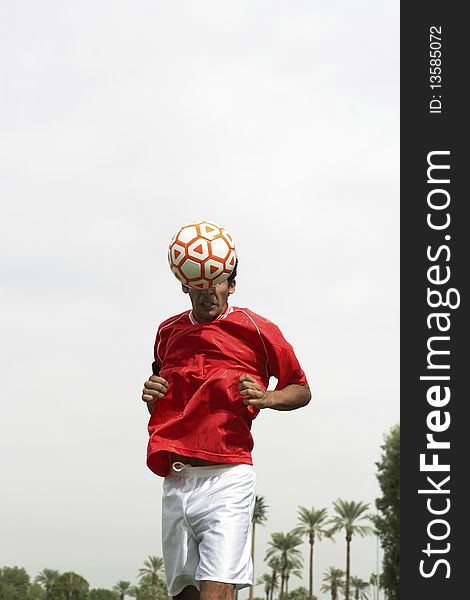 Soccer Player Heading Ball