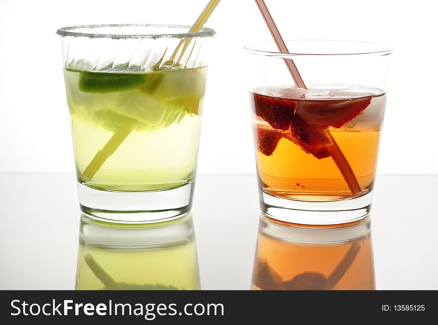 Arrangement of fruit drinks with ice and lemon. Arrangement of fruit drinks with ice and lemon