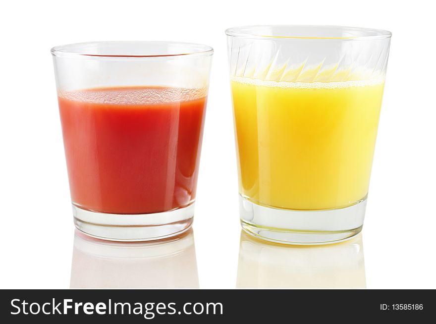 Tomato and orange juice isolated on white background