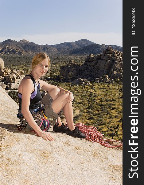 Climber On Rocks With Gear,