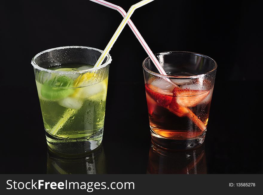 Arrangement of fruit drinks with ice and lemon. Arrangement of fruit drinks with ice and lemon