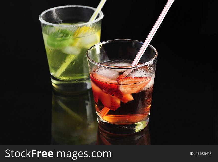 Arrangement of fruit drinks with ice and lemon. Arrangement of fruit drinks with ice and lemon