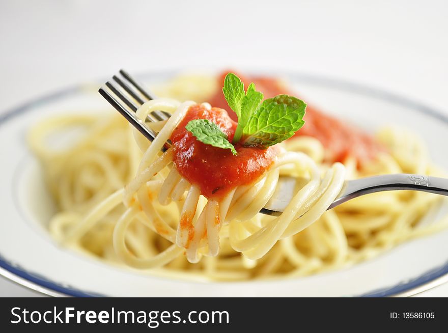 Spaghetti with tomato sauce on a plate