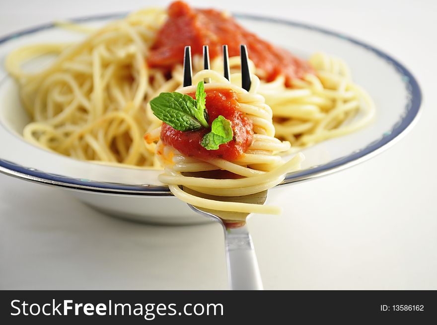 Spaghetti with tomato sauce on a plate