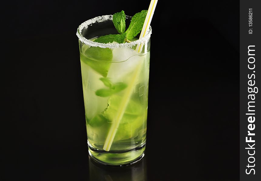 Arrangement of fruit drink with ice, mint and lime. Arrangement of fruit drink with ice, mint and lime