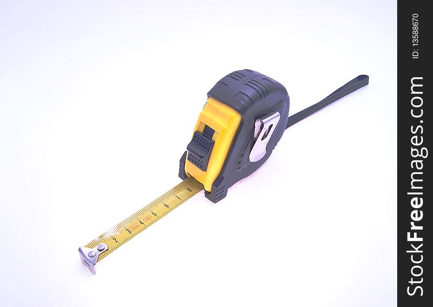 Yellow measure tape on white background