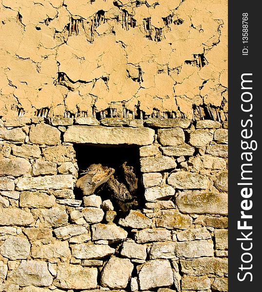 An image of old yellow stone wall. An image of old yellow stone wall