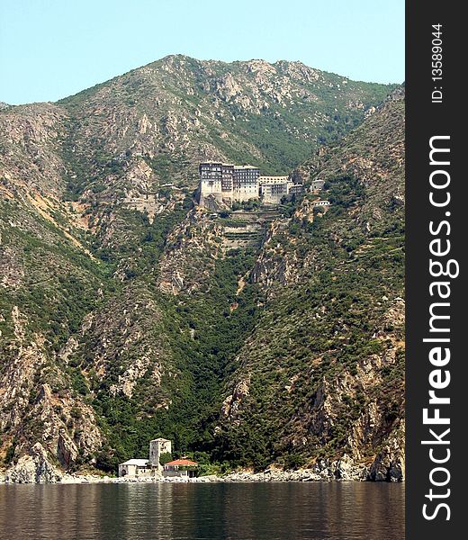 Monastery at holly Mt Athos seen from a cruise ship. Monastery at holly Mt Athos seen from a cruise ship