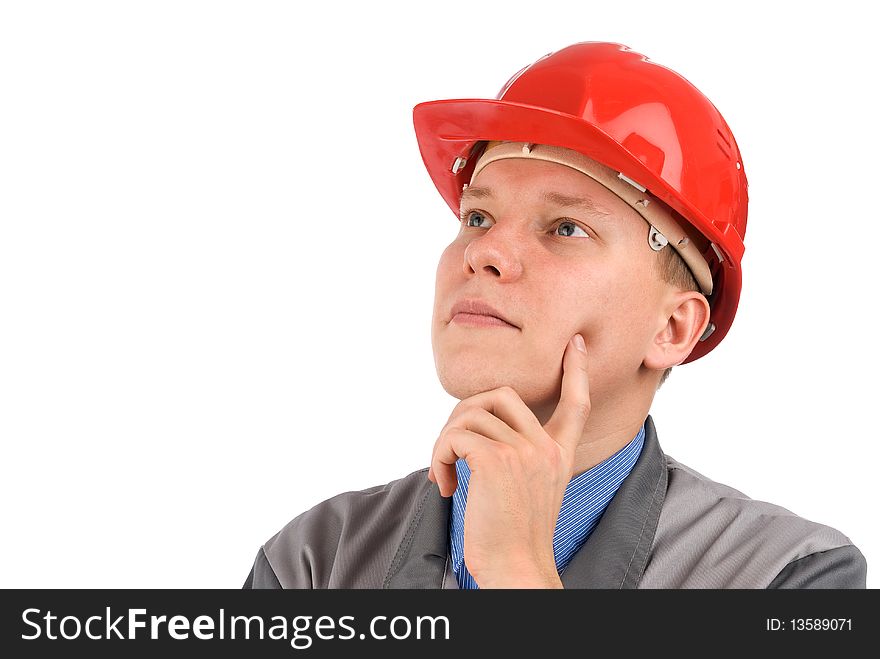 Portrait of a construction worker thinking in a hardhat