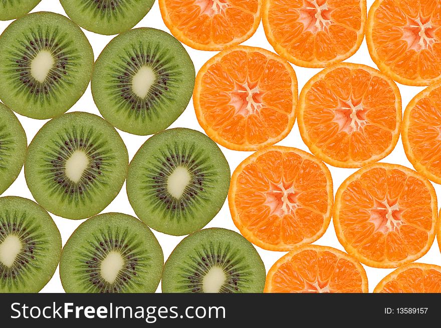Composition made of slices of kiwi and tangerines. Composition made of slices of kiwi and tangerines