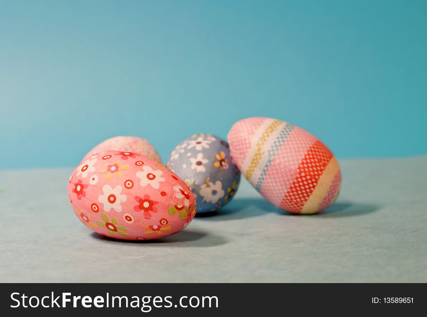 Decorated easter eggs on blue background