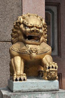 Stone Gold China Lion Sit Royalty Free Stock Photography